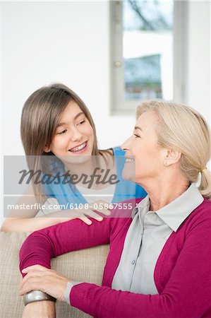 Close-up of a woman smiling with her granddaughter