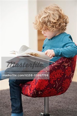 Boy reading a book