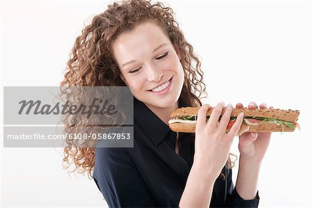 Woman holding a sandwich