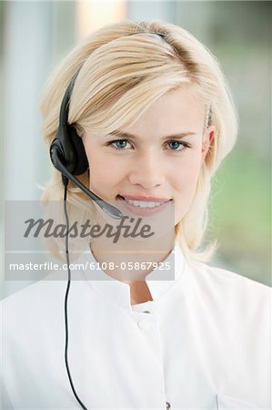 Portrait of a female customer service representative wearing a headset
