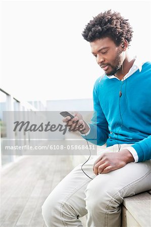 Man listening to an MP3 player