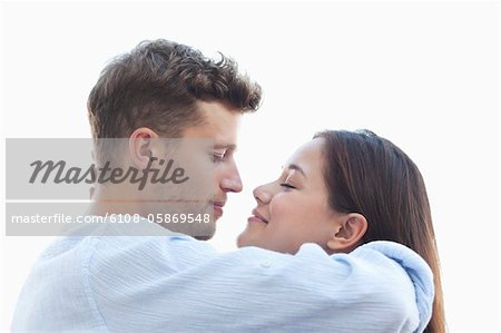 Young couple about to kiss each other