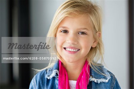 Portrait of a cute little girl smiling