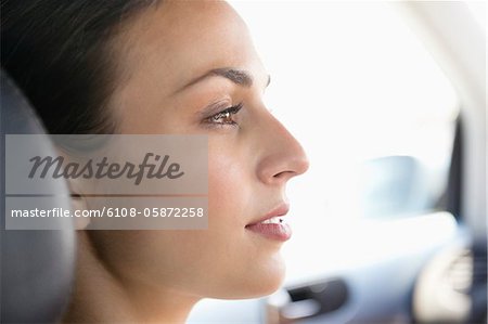 Young woman driving a car