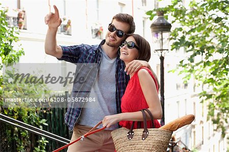 Couple smiling, Montmartre, Paris, Ile-de-France, France