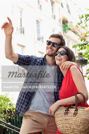 Couple smiling, Montmartre, Paris, Ile-de-France, France