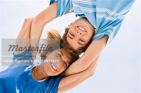 Woman and her grandson huddle together