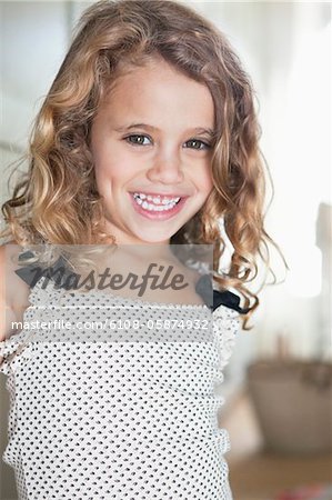 Portrait of a cute little girl smiling