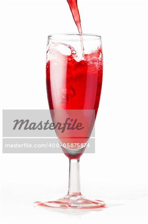 glass with red flowing liquid cut out fro white background