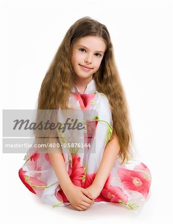 Little girl in red dress  on white background