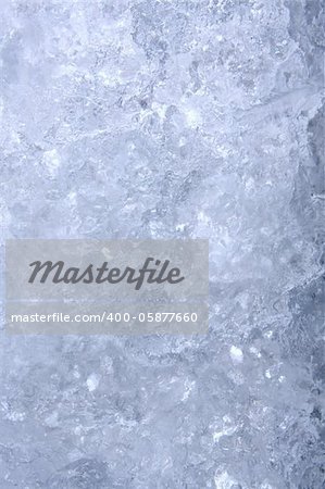 Full frame ice background, frozen water, blue