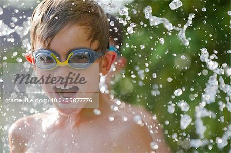Young child playing in the water