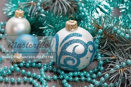 Christmas blue balls and beads decorations close-up shallow DOF