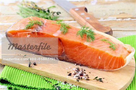 Piece of smoked salmon with dill