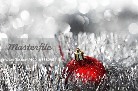 red christmas ball on holiday background