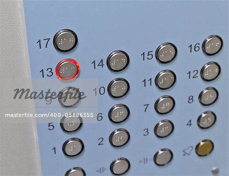 Focus on the thirteenth floor button elevator control panel