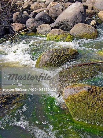 stone in river flow