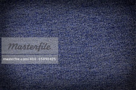 Striped textured used blue jeans denim fabric grunge background