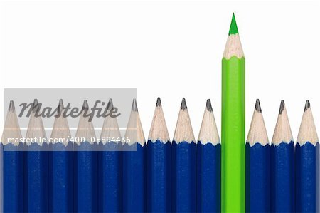 Blue pencils and one green crayon standing out from the crowd. Isolated on white.