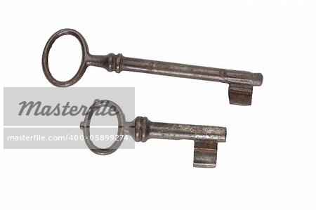two  old rusty keys on white background