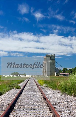 train tracks and grain elevators at Mossleigh Alberta