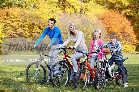 Young family on bicycles