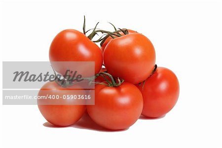 seven ripe tomatoes on white background