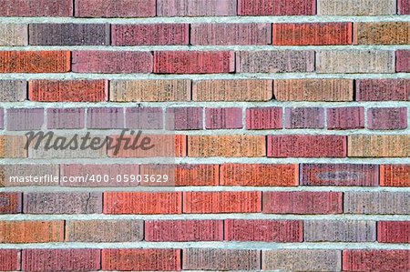 Vibrant multi color red brick wall pattern