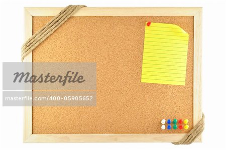 sticky note pinned on cork notice board