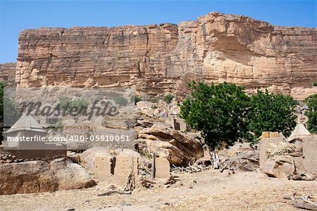 The principal Dogon area is bisected by the Bandiagara Escarpment.  The Dogon are best known for their mythology, their mask dances, wooden sculpture and their architecture.