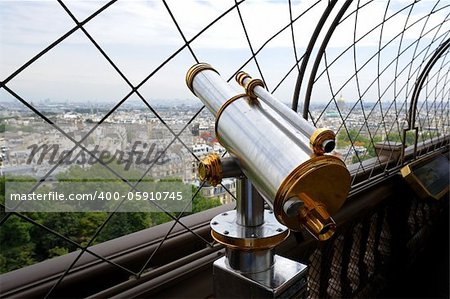 Telescope on top floor of Eiffel Tower in Paris, France. Useful file for your brochure, flyer or website about France sightseeing.