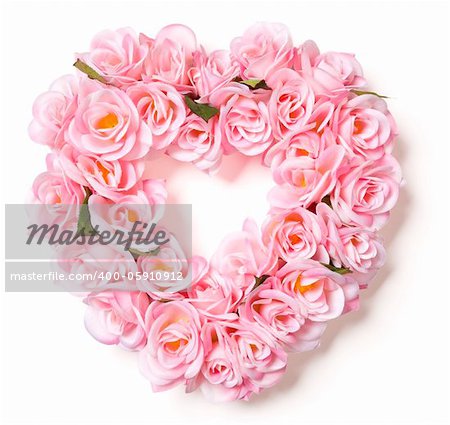 Heart Shaped Pink Rose Arrangement on a White Background.