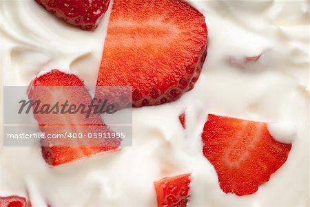 Chopped strawberries in white whipped cream