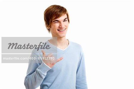 Handsome young man doing a surf gesture, isolated over a white background