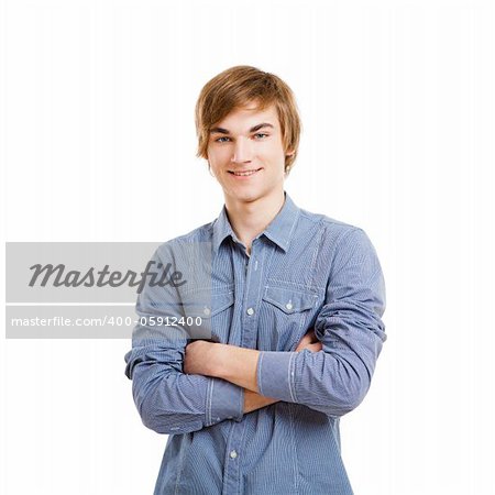 Happy young man with arms folded, isolated over a white background