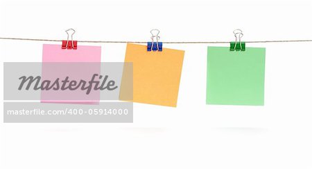 Blank color paper sheets on rope