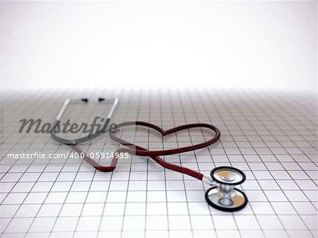 stethoscope heart shape on tiled floor