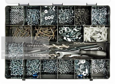 Plastic handyman's toolbox with screws, bolts and some tools.