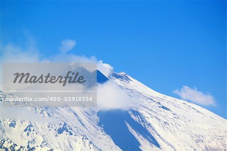 Photo of mountain Etna in snow