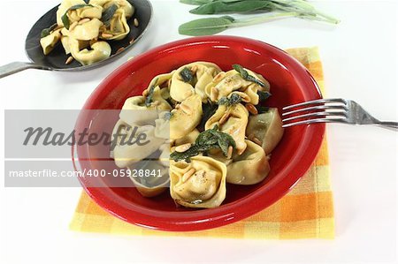 fresh stuffed tortellini with sage butter and pine nuts