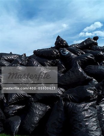 Large group of Garbage Bags towards blue sky