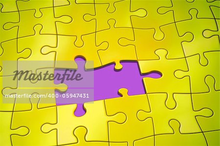 An image of a yellow jigsaw puzzle