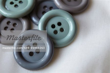 Close up of grey buttons