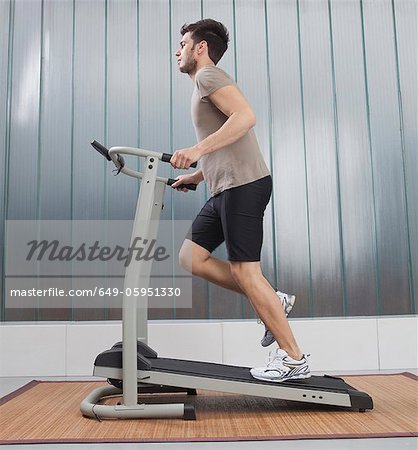Man using exercise machine