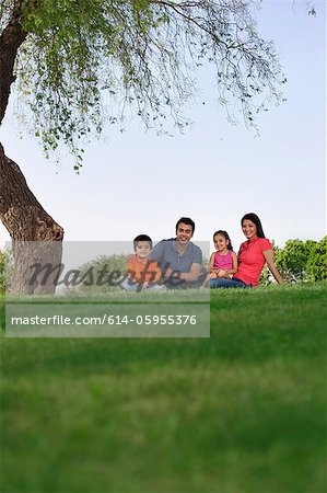 Portrait of a family in a park