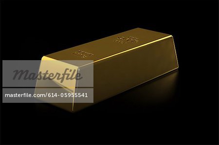 Fine gold bar on black background