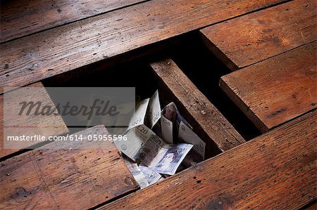 Money under floorboards