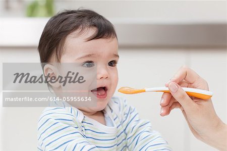 Baby boy being fed