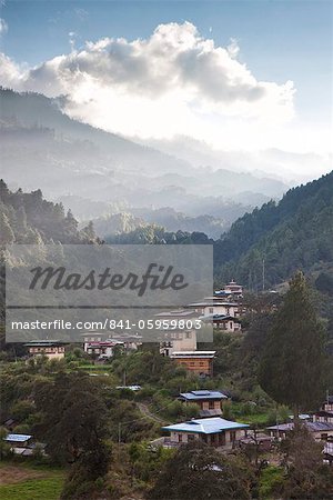 Village of Chendebji set among forested hills between the towns of Wangdue Phodrang and Trongsa, Bhutan, Himalayas, Asia