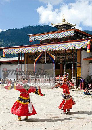 Buddhist monks performing masked dance during the Gangtey Tsechu at Gangte Goemba, Gangte, Phobjikha Valley, Bhutan, Asia